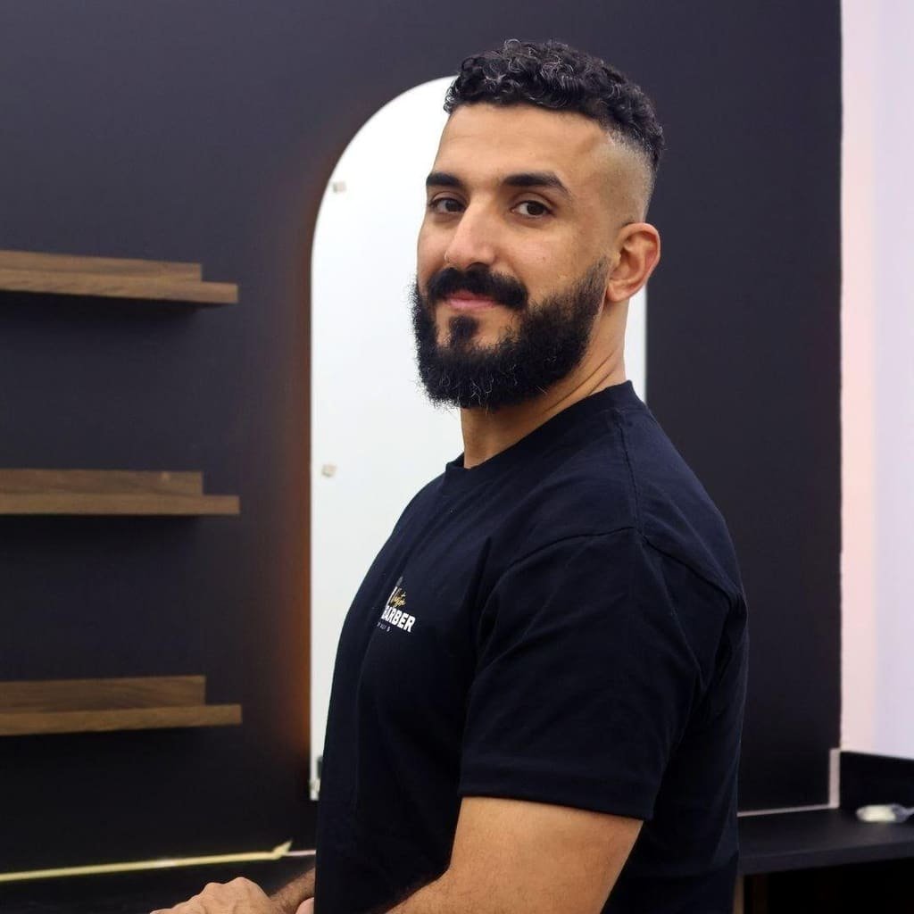 Ali D, master barber at Dayton Barber